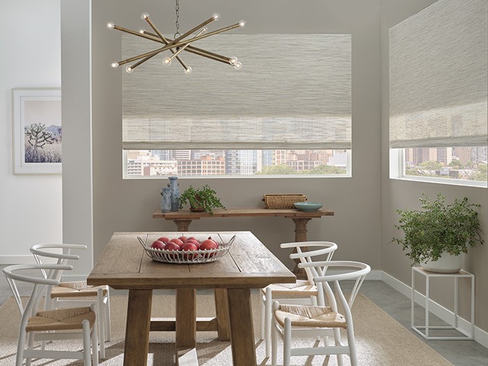 Dining room windows Provenance® Woven Wood Shades; Fabric: Positano  Color: Pebbled Beach